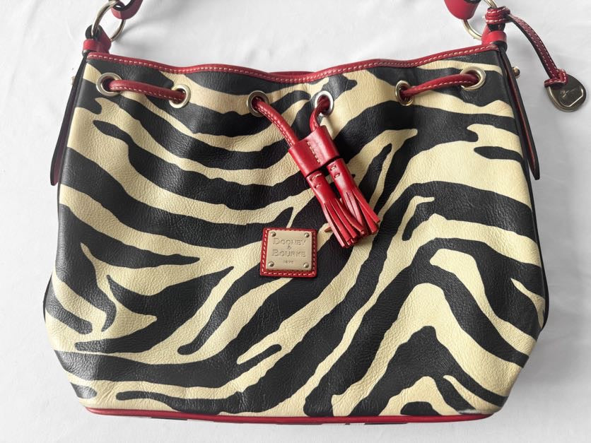 Y2K Dooney and Bourke Safari Cream Zebra Print Leather Drawstring Bucket Bag