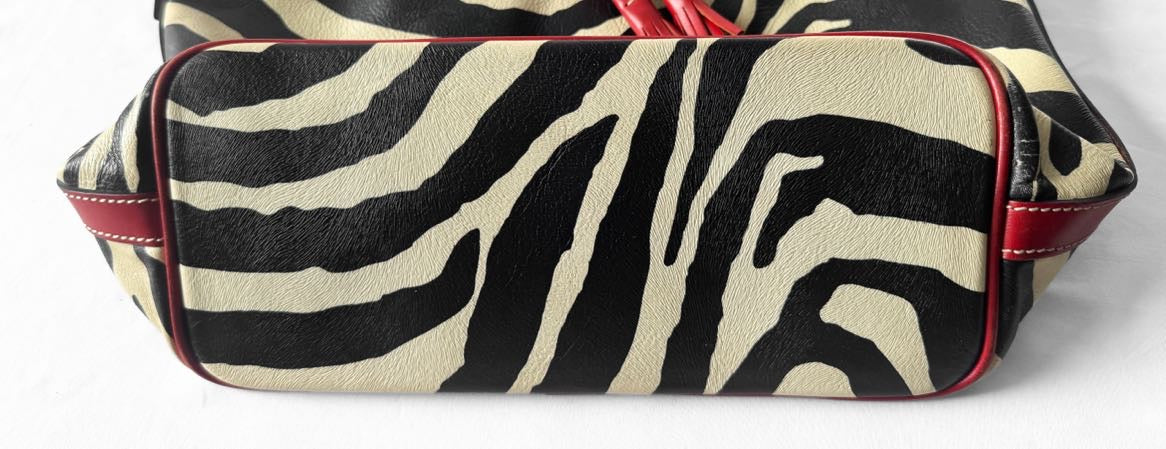 Y2K Dooney and Bourke Safari Cream Zebra Print Leather Drawstring Bucket Bag